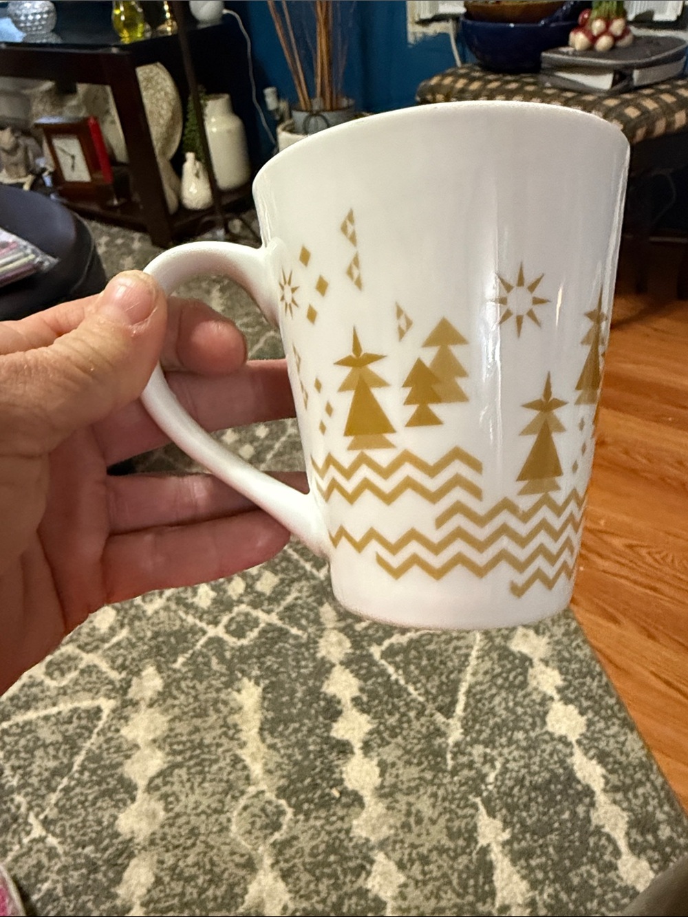 This is the 2013 holiday Christmas mug with gold accents from from Starbucks